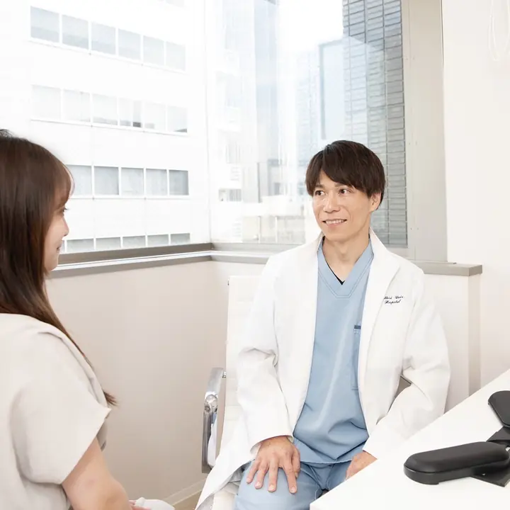 診察室で話をする田本直弘